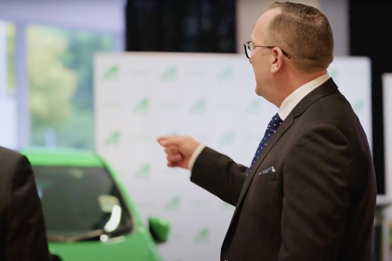 Todd Eagles viewing the ActewAGL Green EV on display