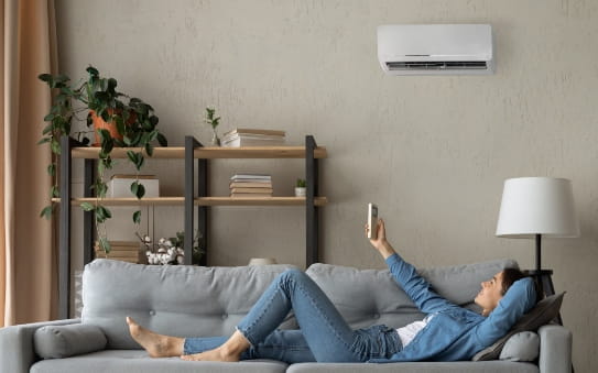 person under an Air-conditioner.